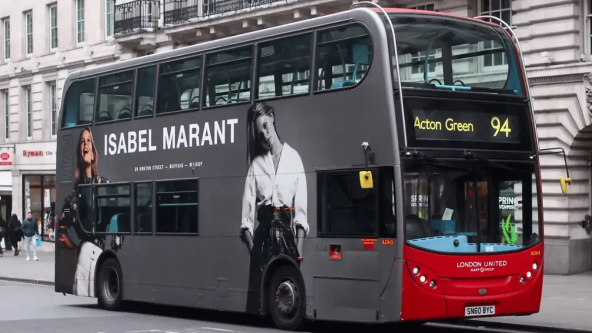 Why do luxury and global brands invest in London bus advertising? 
