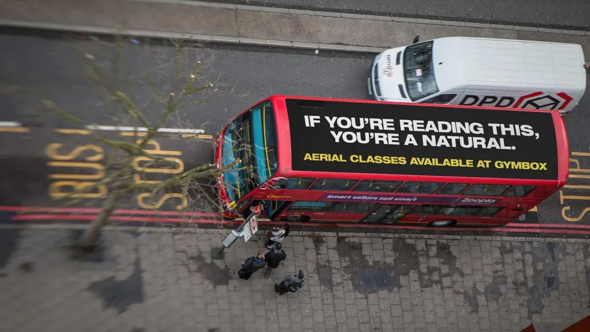 Creating Standout Brand Visibility with Bold Rooftop Bus Ads Across London