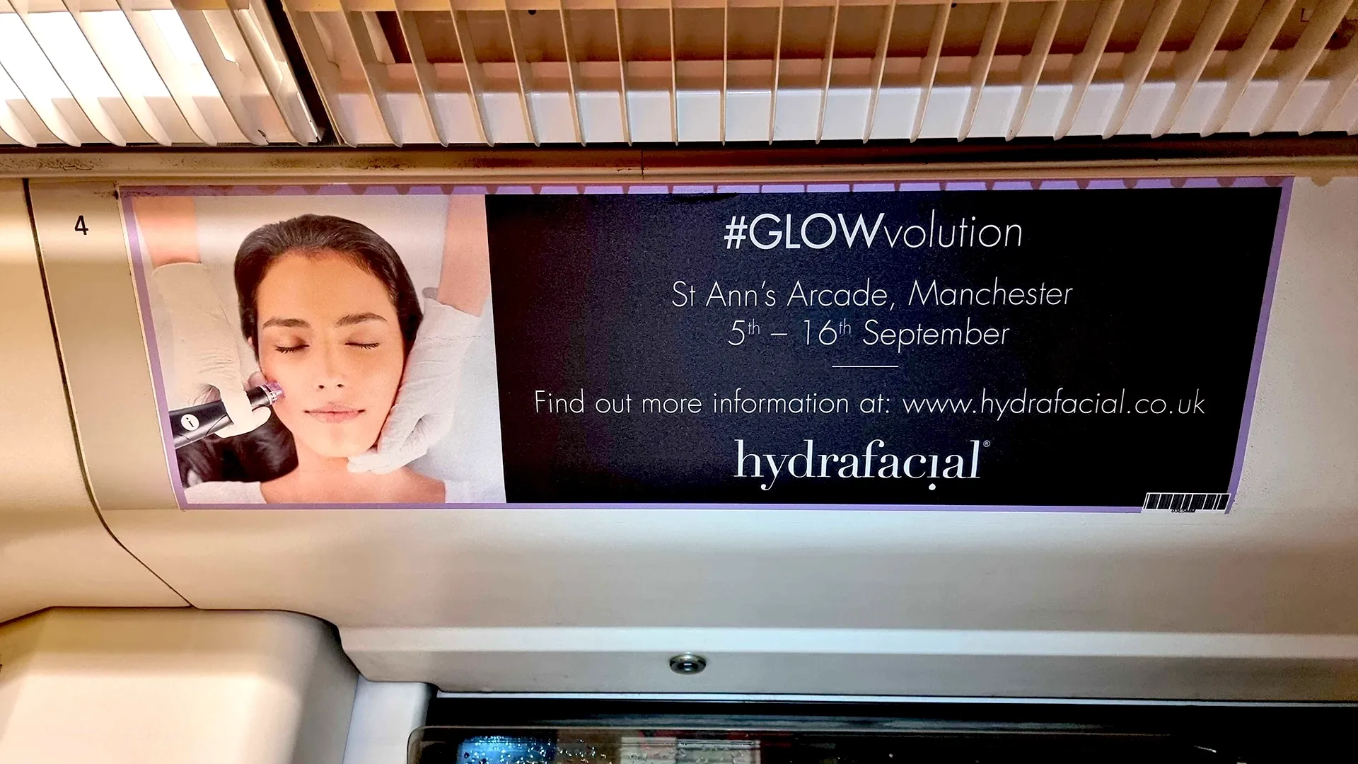 An interior advert for Hydrafacial on a London bus