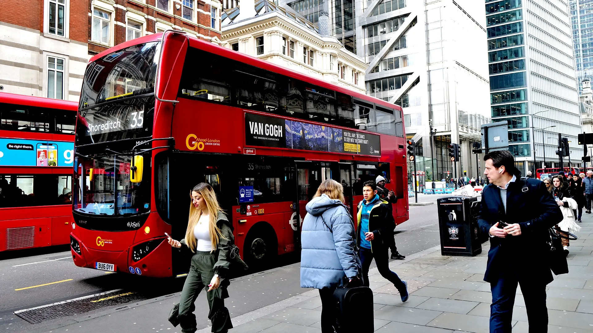 A superside advert for the immersive Van Gogh experience on the side of a London bus