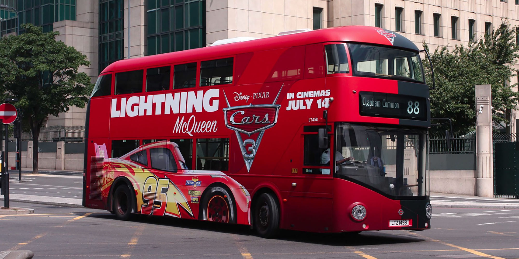 Full wrap bus advertising cars the Movie